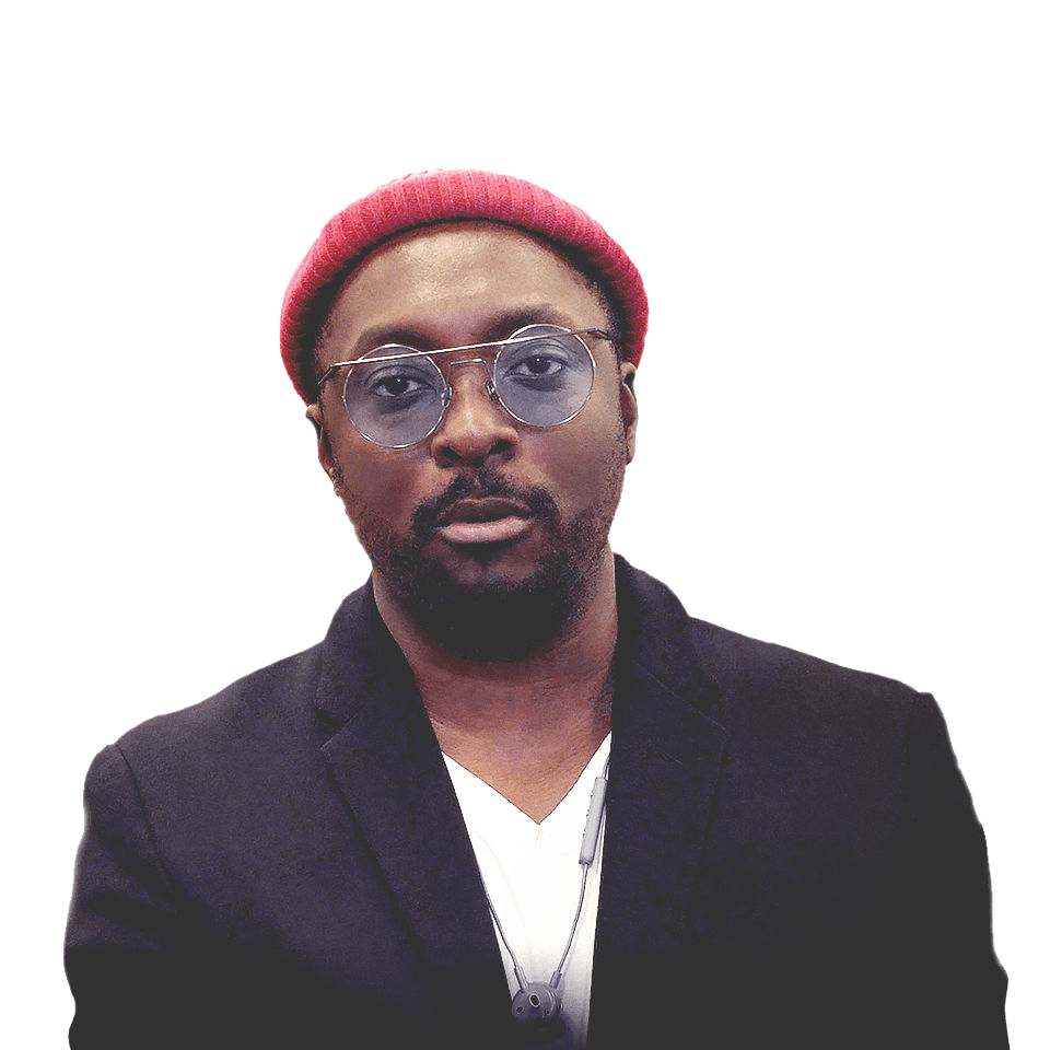 Will.I.Am, artista ganador de un Grammy y activista de SIG, con un aula de fondo