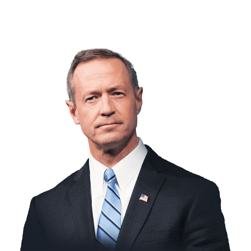 Martin O’Malley, gobernador de Maryland, vestido de traje y corbata con un pin de la bandera estadounidense en la solapa y un embarcadero al fondo.