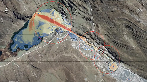 3D city map visualization with tall columns in varying heights and colors from gray to yellow, indicating data intensity across different areas on a dark blue grid.