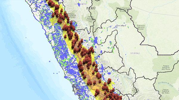 3D floor plan visualization of a large building, showing rooms, corridors, and open spaces in various shades of blue, white, and beige with a green area outside.