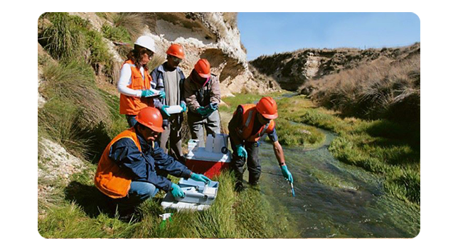 A desktop computer displaying mapping and analysis tools in ArcGIS software