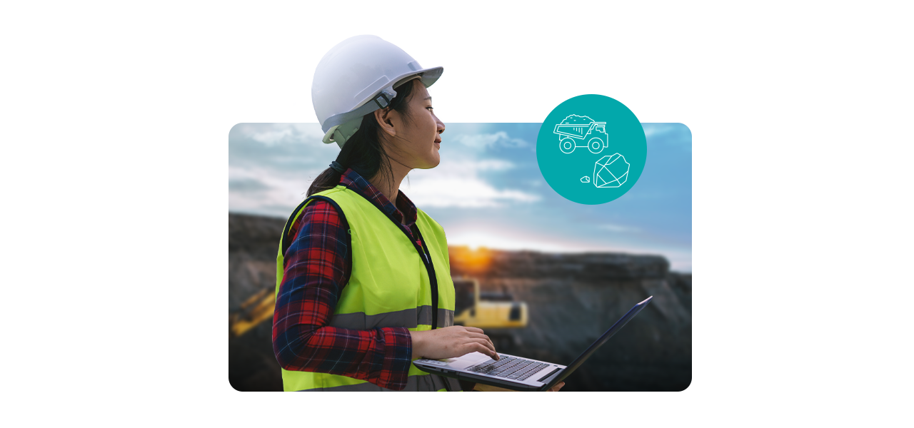 Dos personas que llevan ropa de invierno y equipo de seguridad naranja quitando la nieve acumulada a lo largo de una carretera transitada