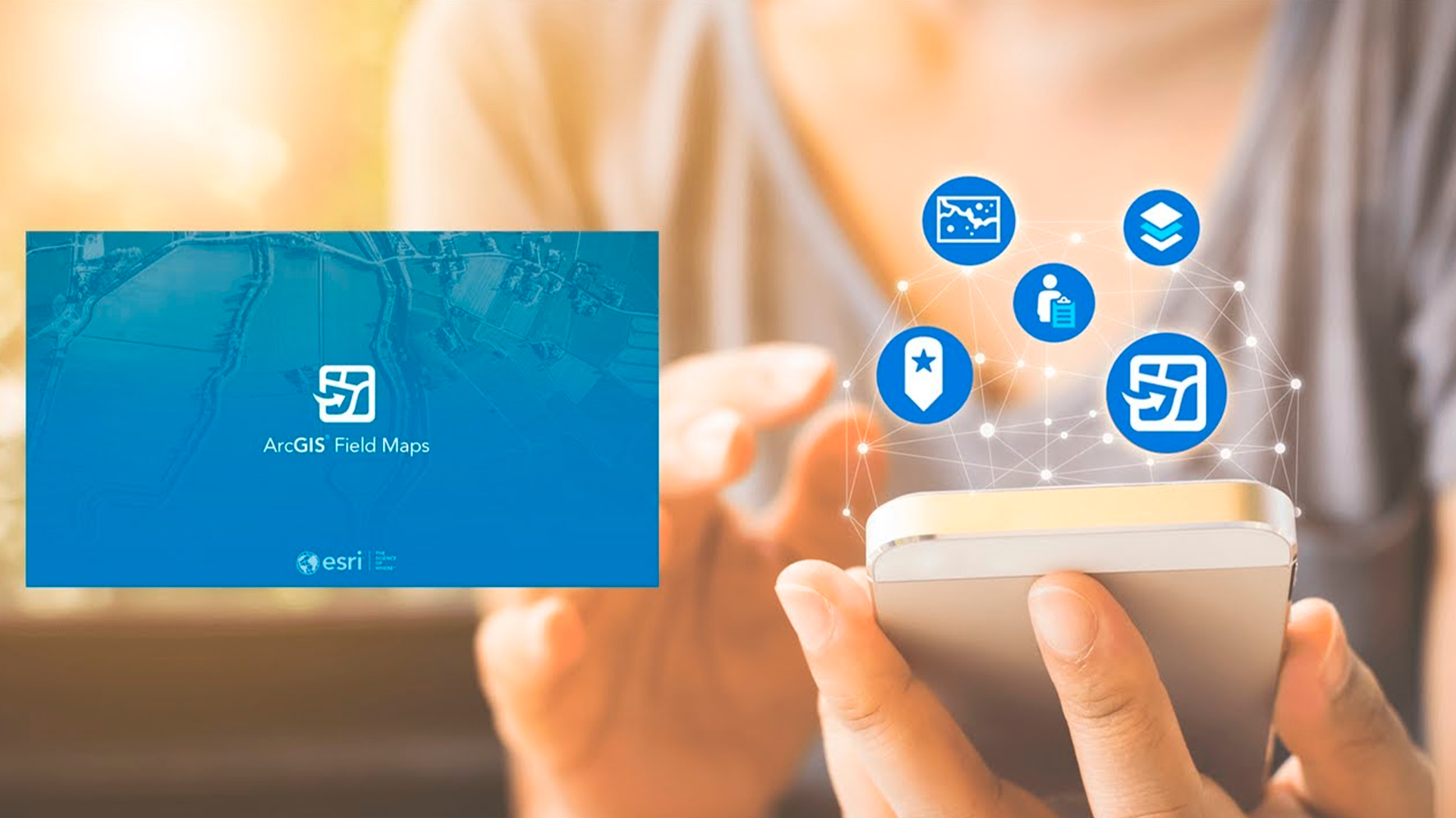 Three young adults smiling while backpacking through a field