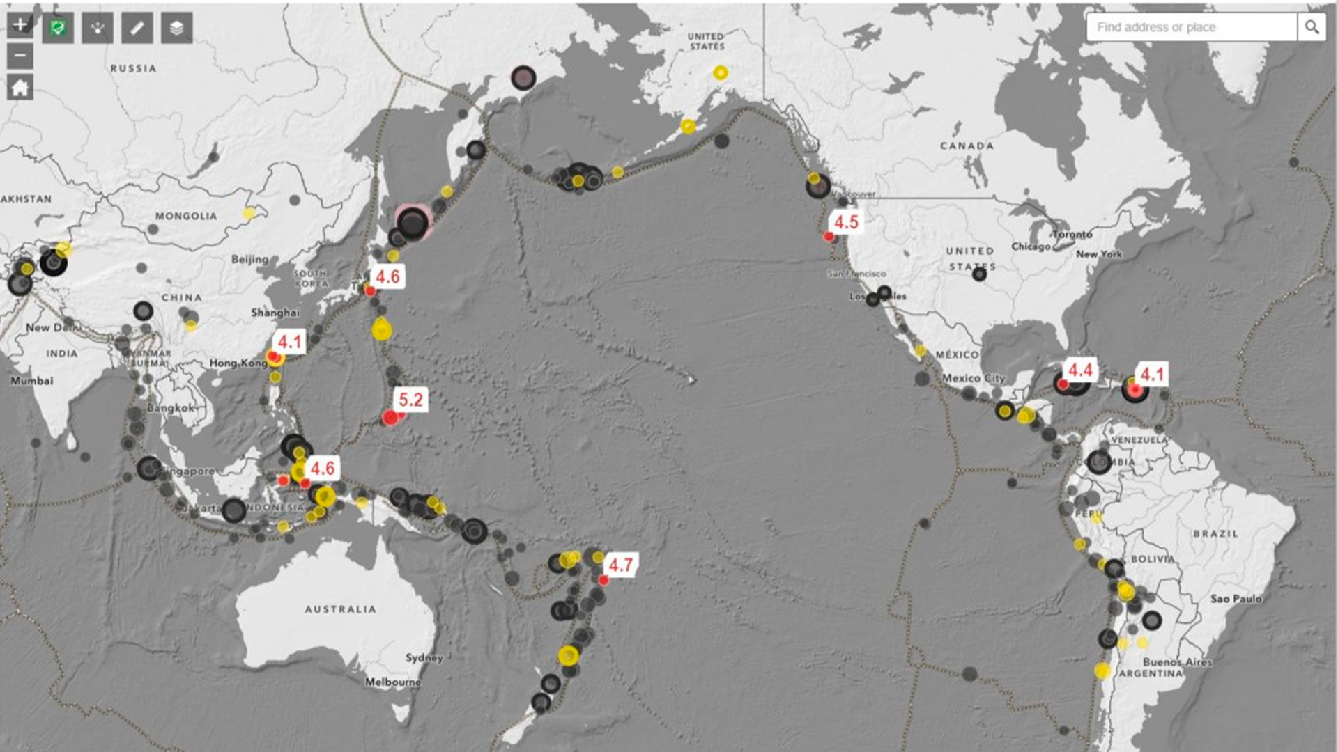 Three young adults smiling while backpacking through a field