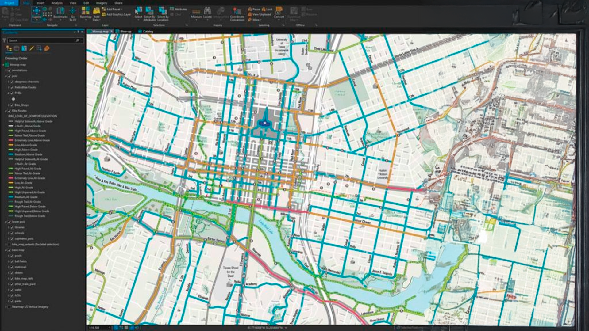 Three young adults smiling while backpacking through a field