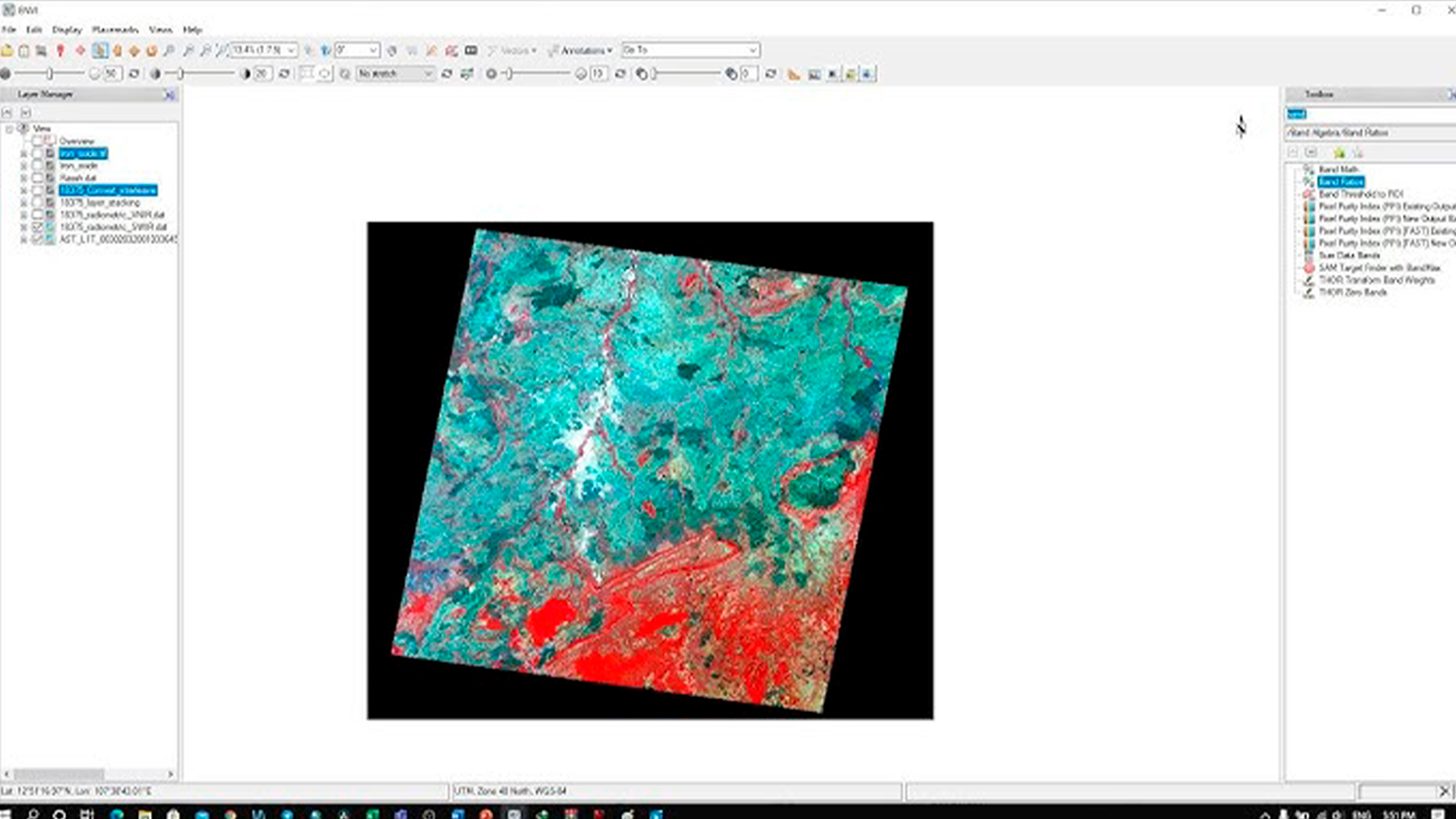 Three young adults smiling while backpacking through a field