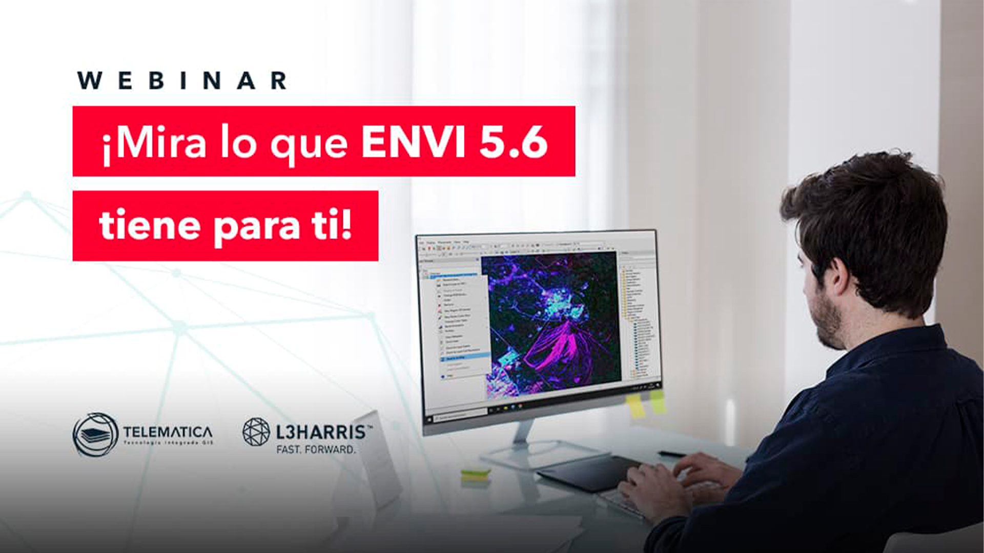 Three young adults smiling while backpacking through a field