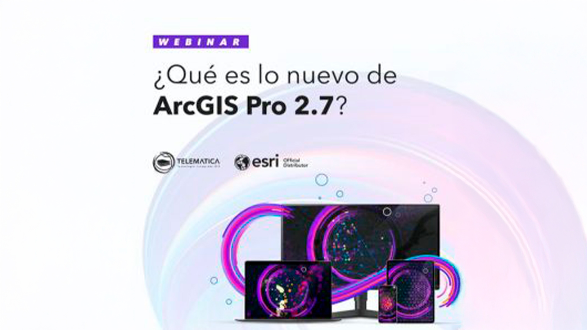 Three young adults smiling while backpacking through a field