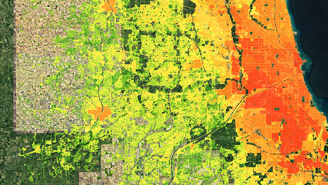 Un mapa de una ciudad costera muestra puntos calientes rojos en el centro que se van difuminando a naranja, amarillo y verde en los suburbios y áreas rurales cercanas