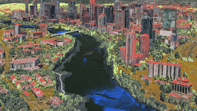 Representación en 3D de una ciudad con puntos verdes y rojos superpuestos, edificios y una masa de agua azul