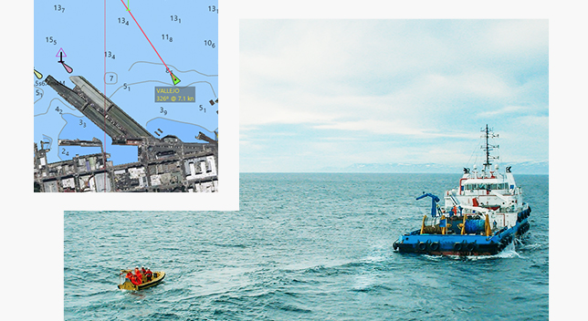 A composite photo of a large sunlit farmland with an overlay of a colorful heat map grid as a drone flies overhead